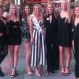 Super classy black and white jumpsuit. Size Small.